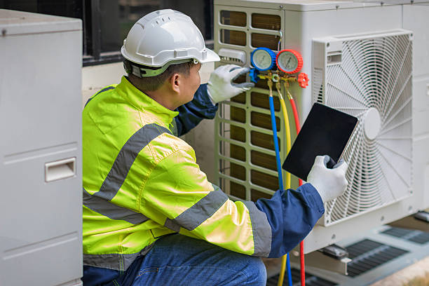 Professional Ac Installation technician working in Line Lexington, PA